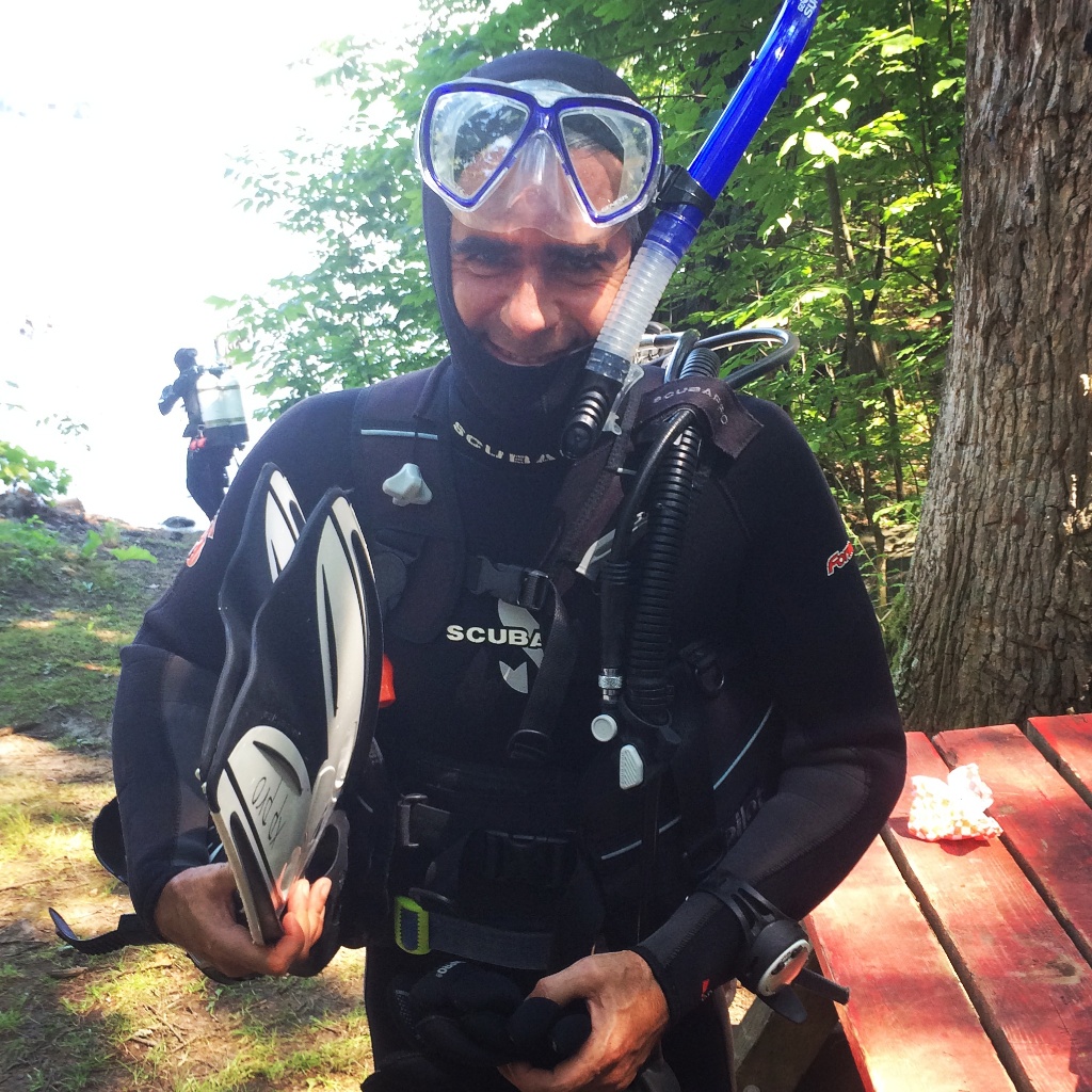 Getting suited up for my open water first scuba dive, in the St. Lawrence