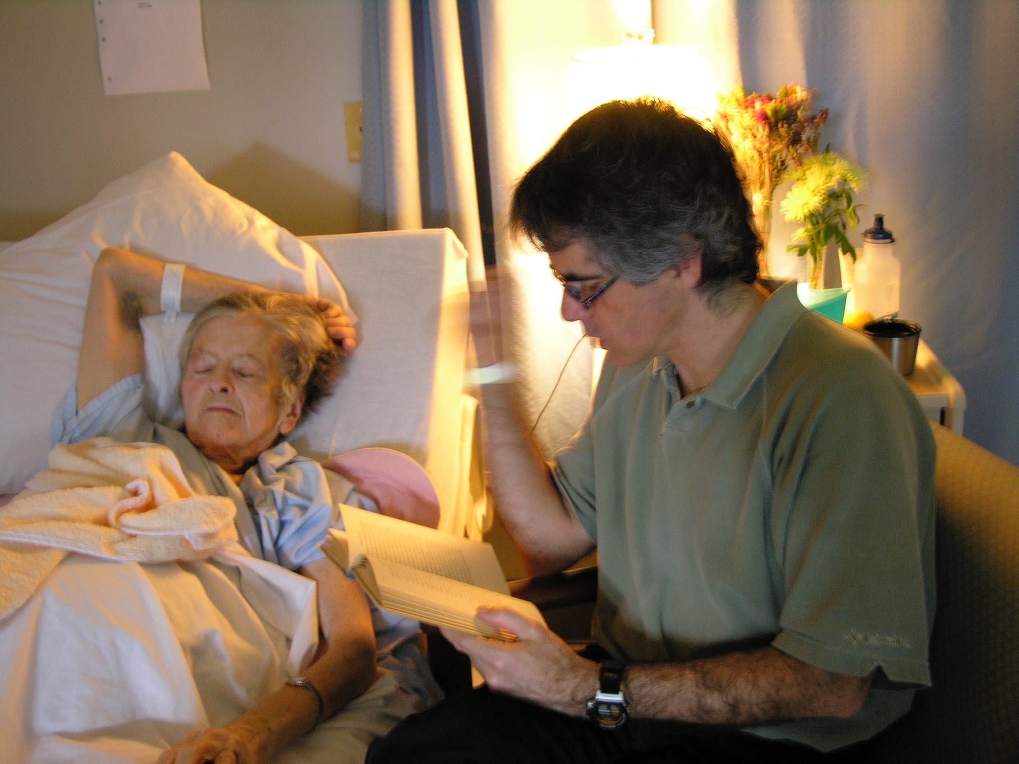 Reading to my mum at the Delta hospital