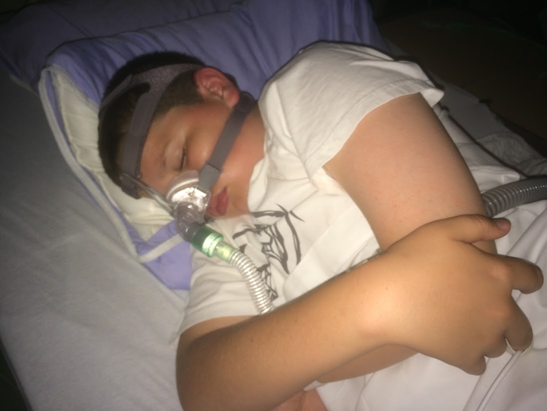 Kyle tries out the new ventilation system, sans trach, at McMaster, June 2016.